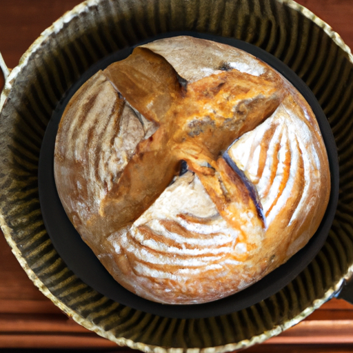 Freshly baked artisan bread with a golden crust, made using a Dutch oven for the perfect texture.